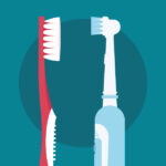 A red manual toothbrush next to an electric toothbrush against a teal background