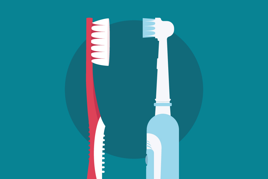 A red manual toothbrush next to an electric toothbrush against a teal background