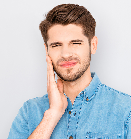 man with mouth pain